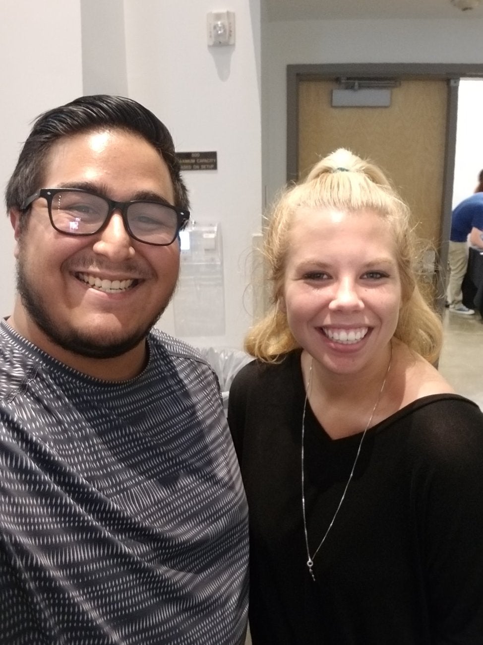 Jonathan Aguirre takes a selfie with the featured speaker, Megan Stier. Image of a woman smiling with the article's author