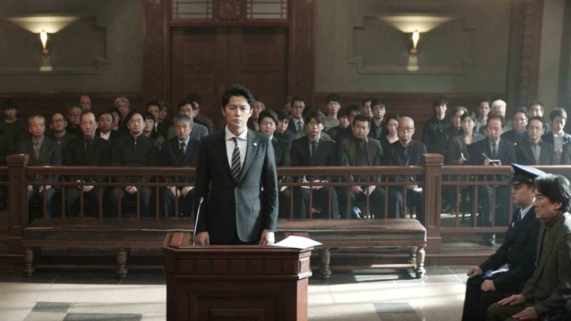 A still from "The Third Murder," February's film Man stands before court