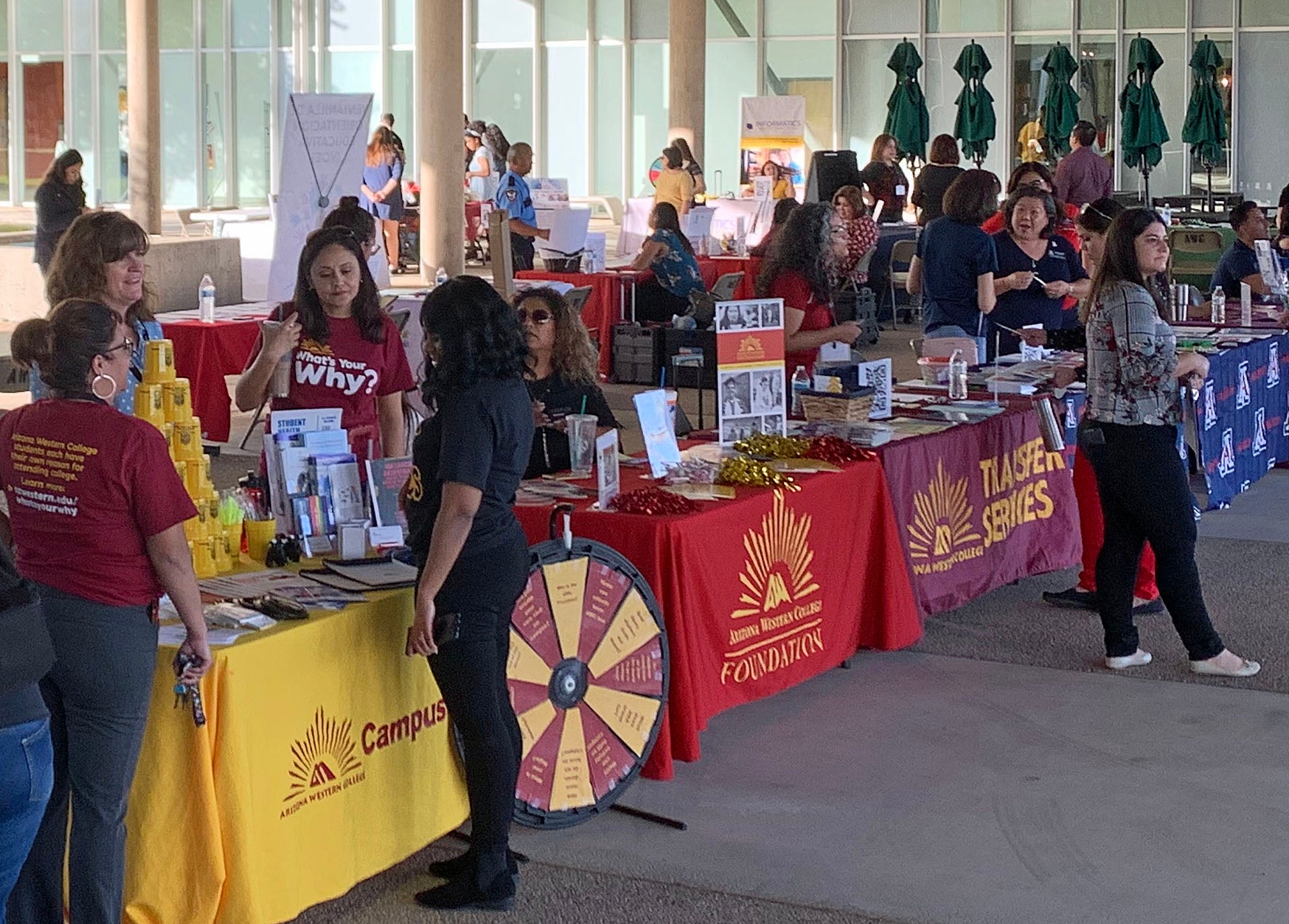 Exhibits were running in full swing at the Career and Majors Fair held on the Yuma Campus in November. Photo by Meghan McCullen Booths next to each other displaying different clubs