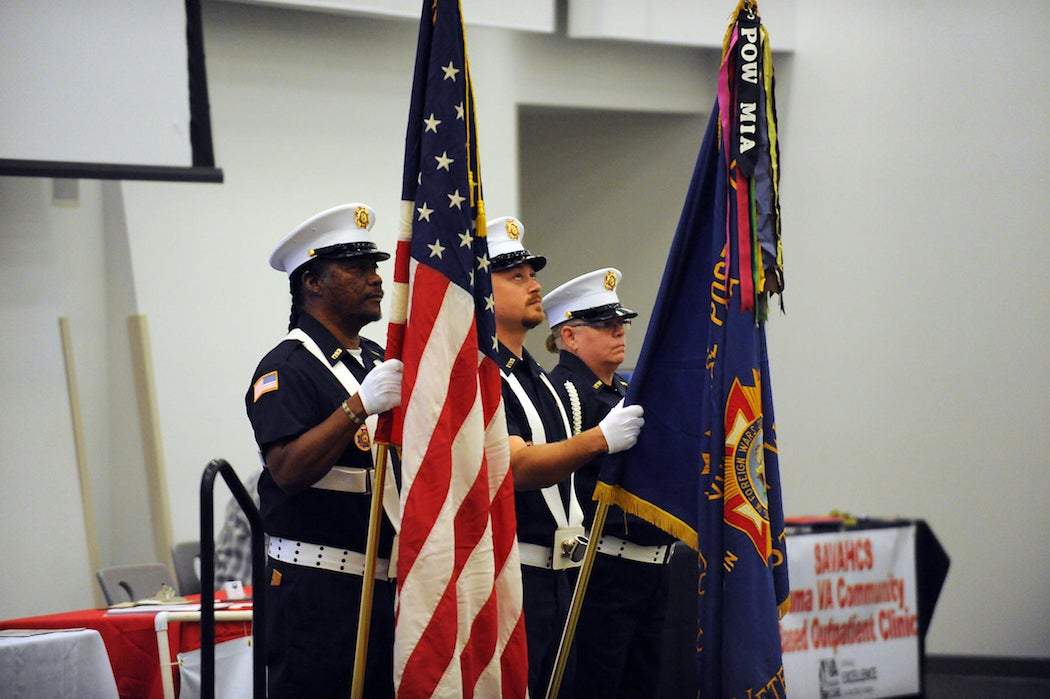 Veterans holding flags