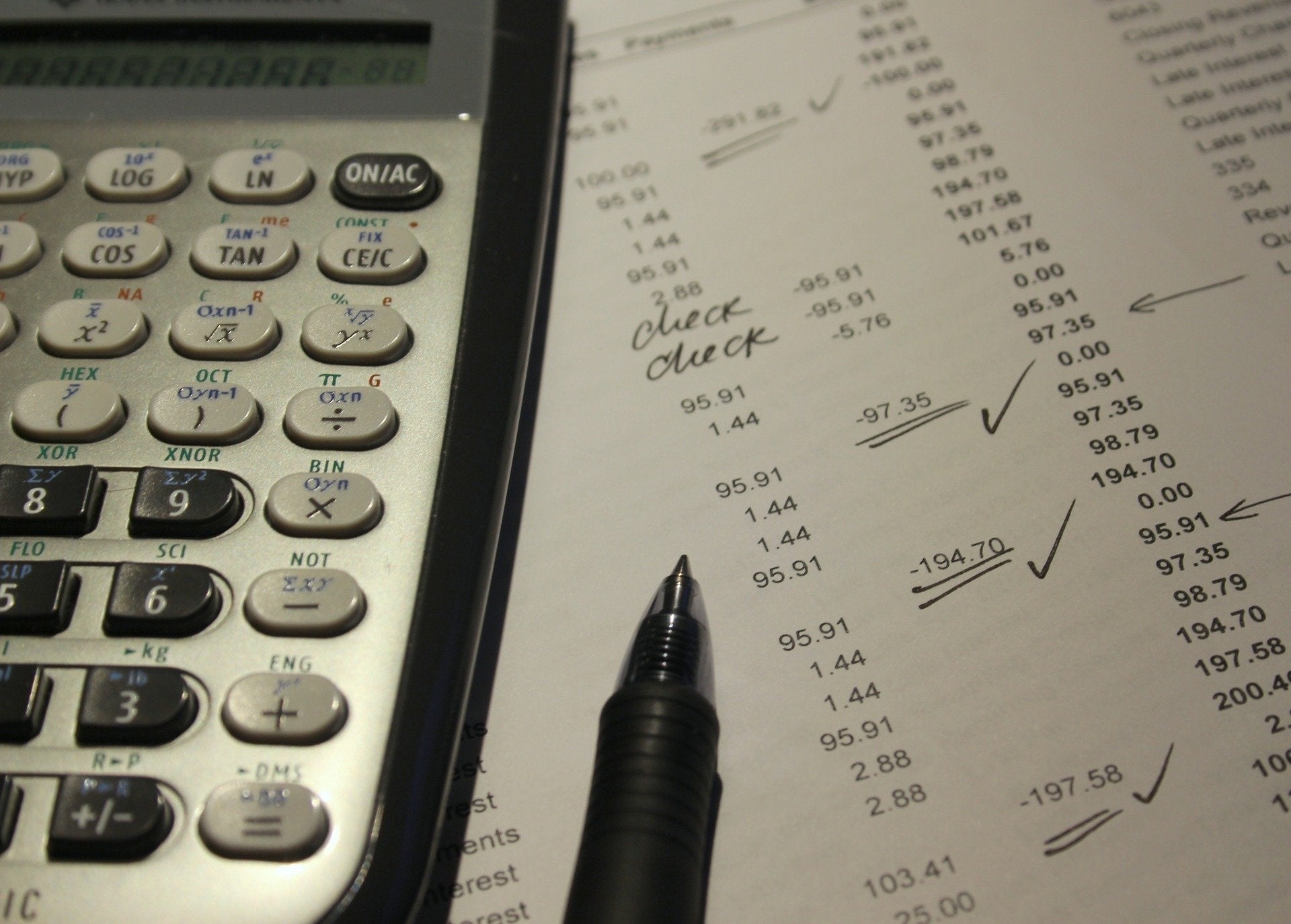 Photo illustration from pixabay.com A calculator and pen sit atop a paper used for finance checking