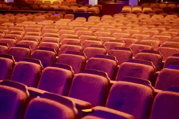 rows of empty theater seats